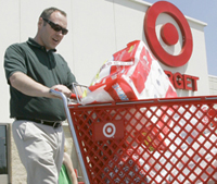 Image: Fairly happy blind shopper with a cart of target goods.